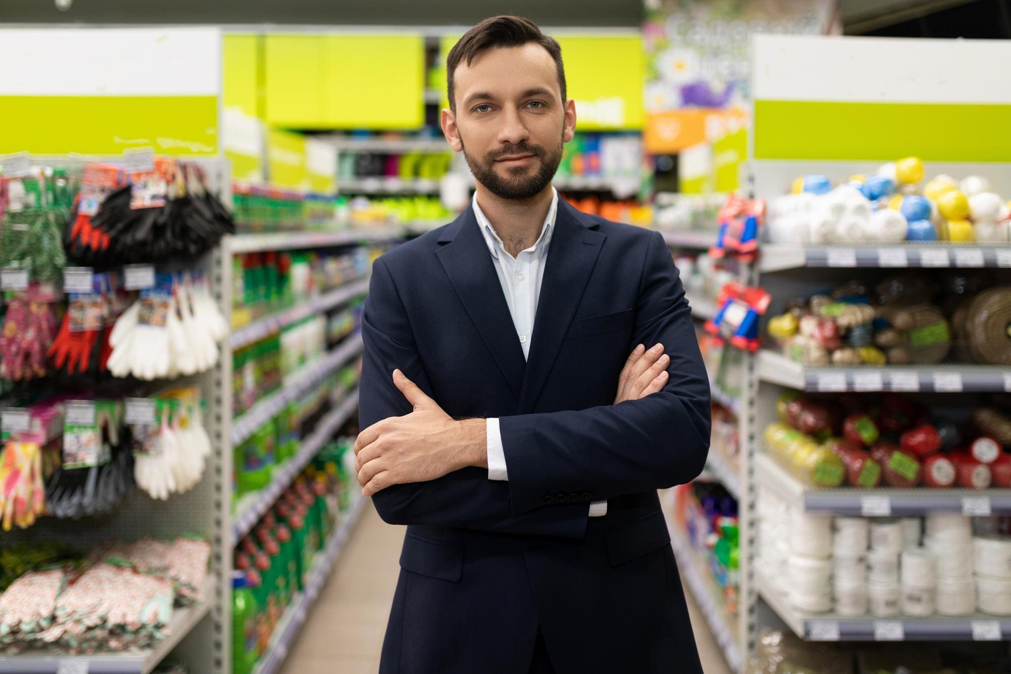 Store manager reviewing an onboarding and product training dashboard
